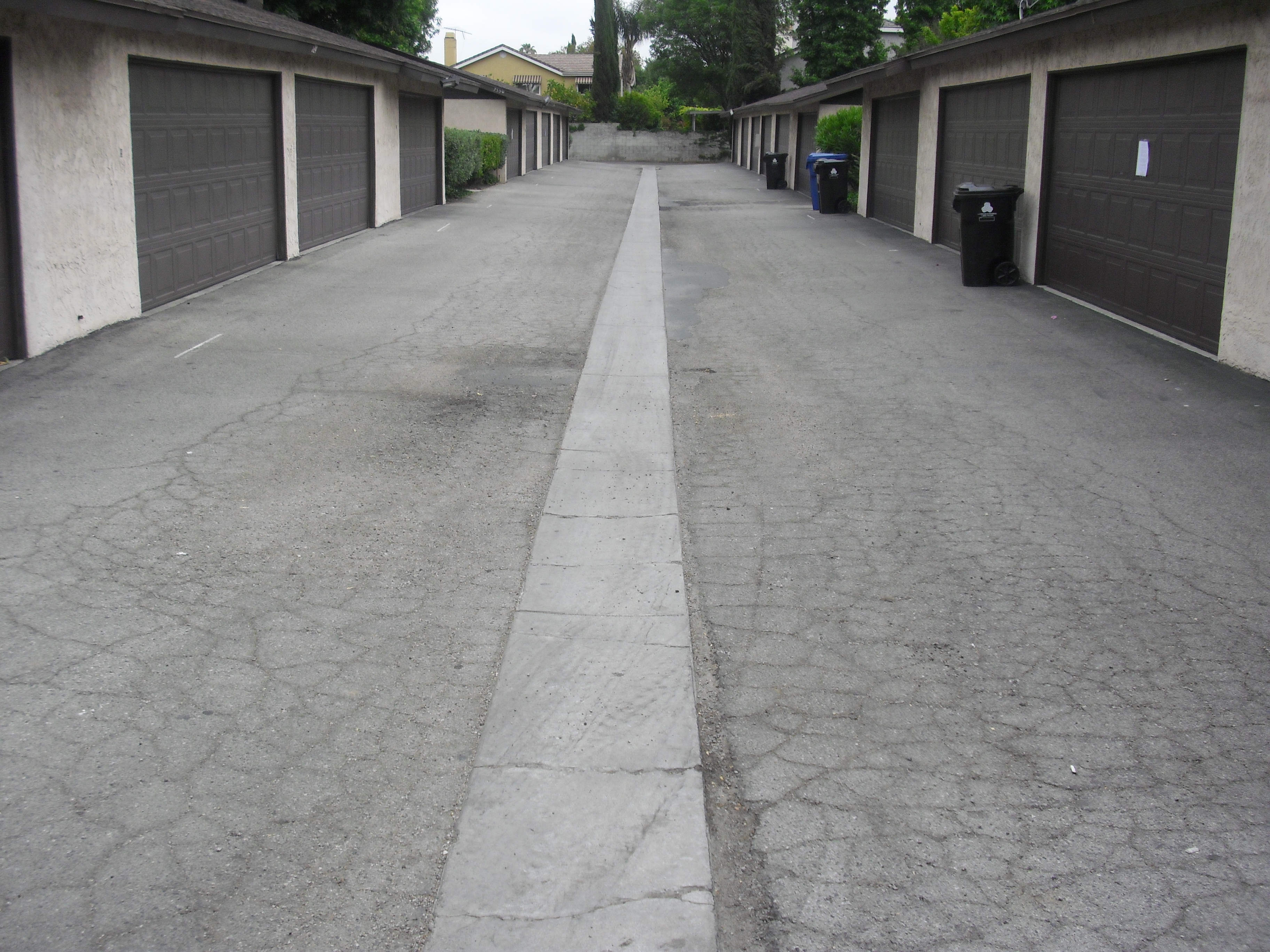 New Asphalt Pavement and Concrete Swell